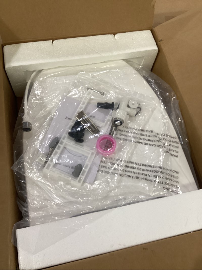 Condition photo showing New/Like New for bidet toilet seat, elongated, electric, warm water, air dryer, heated seat and slow close lid, front and rear wash, night light, wireless remote, 102 (elongated) oval