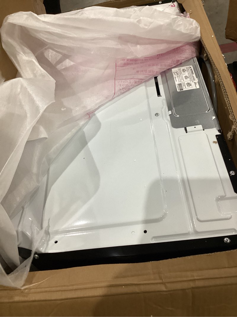 Condition photo showing As Is for ge - 1.6 cu. ft. over-the-range microwave - stainless steel