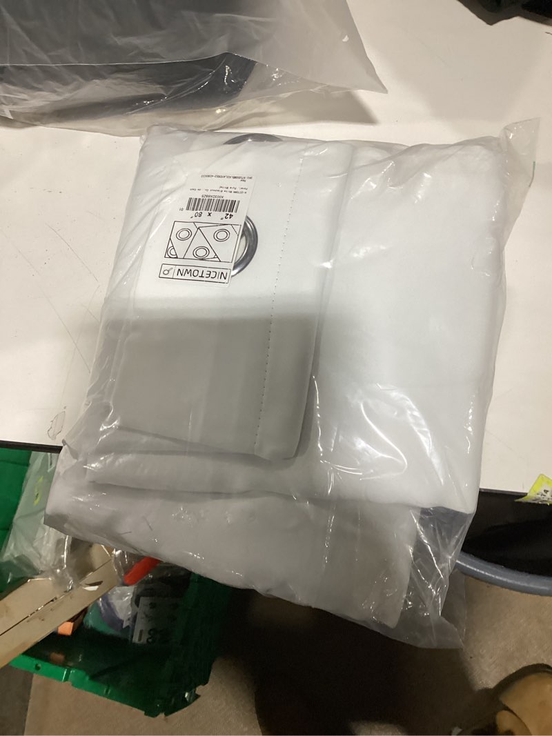 Condition photo showing New/Like New for NICETOWN White Blackout Curtains 80 inches Long, Full Light Blocking Drapes with Black Liner for Nursery, Thermal Insulated Draperies for Hall, Villa (2 Pieces, 42" Wide Each Panel, Pure White) Pure White 42"W x 80"L (Pack of 2)