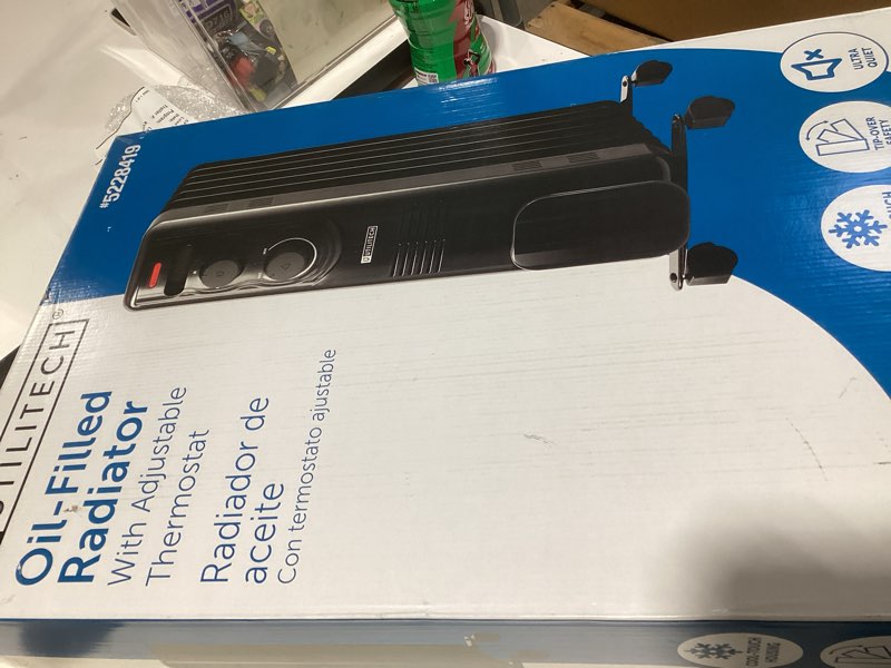 Condition photo showing As Is for utilitech 1500 -watt oil-filled radiant utility indoor electric space heater with thermostat
