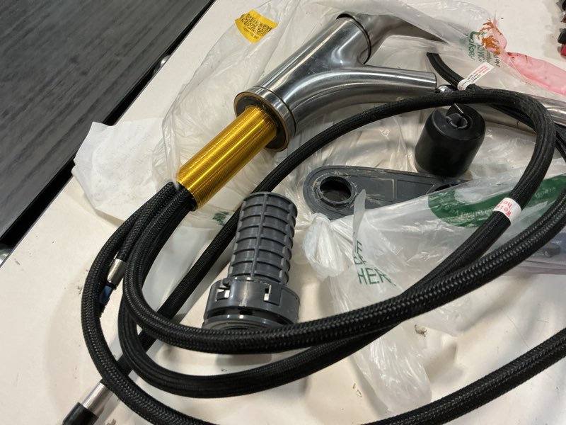 Condition photo showing As Is for kraus odelia chrome single handle deck-mount pull-down kitchen faucet with sprayer
