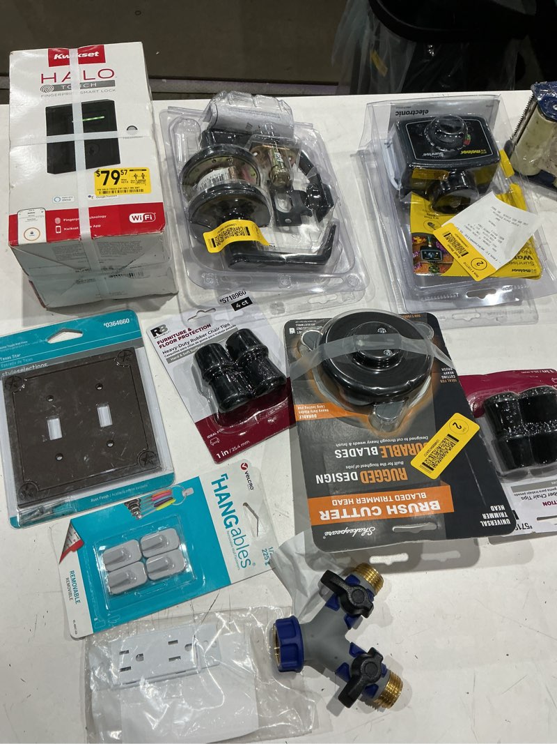 Condition photo showing As Is for assorted home improvement lot (small tools, screw, home accessories, etc.)