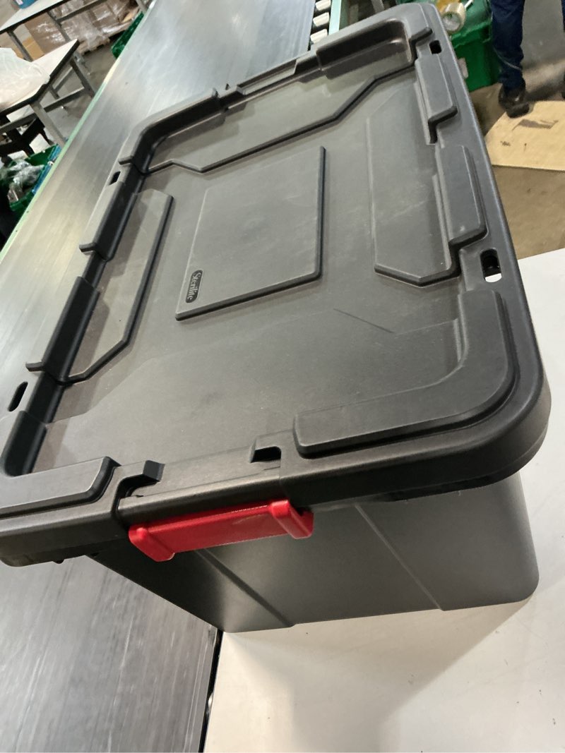 Condition photo showing New/Like New for sterilite 27 gallon industrial tote  rugged plastic storage bin  latch lid  black 1 piece