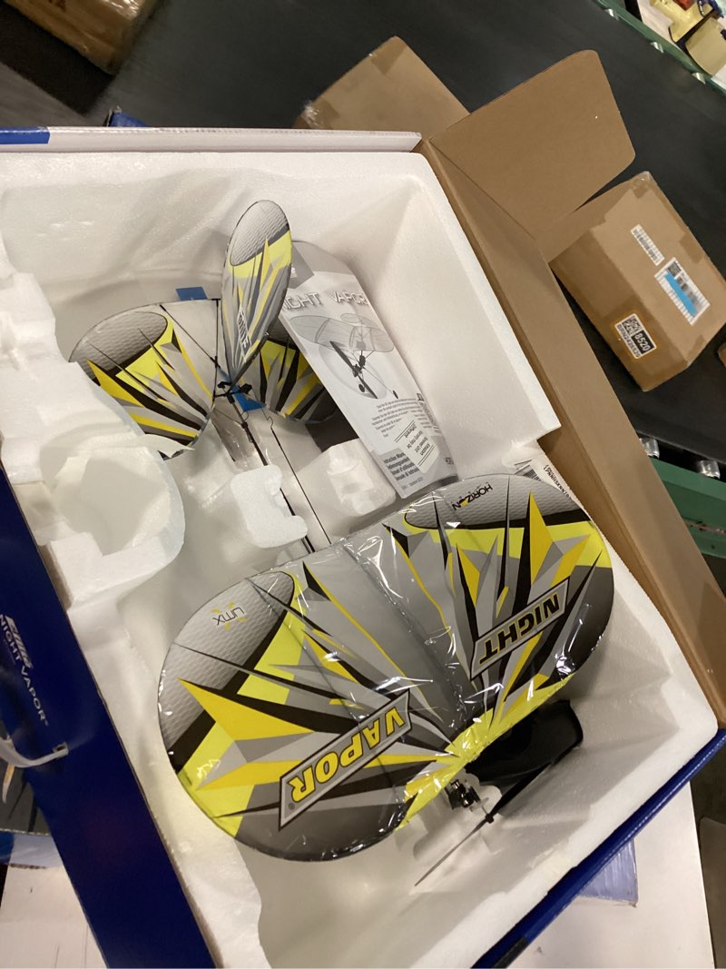 Condition photo showing As Is for E-flite RC Airplane UMX Night Vapor RTF to Fly is Included with AS3X and Safe Select EFLU1300 Ready-To-Fly