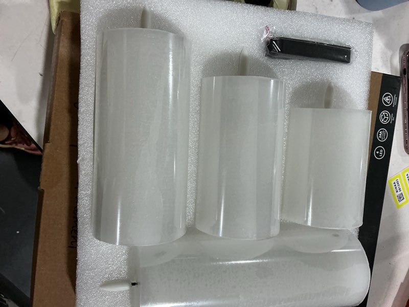Condition photo showing Good Condition for lusharbor flameless candles, 4 pack battery operated candles with remote, real wax led fake candles with timer flickering for christmas wedding home party d3 h 5" 6" 7" 9" white
