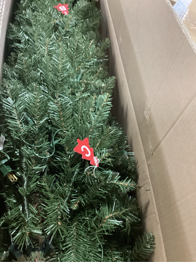 Condition photo showing New/Like New for Puleo International 7.5ft Pre-Lit Slim Fraser Fir Christmas Tree with 350 Clear Lights, 1188 Realistic Dense Branch Tips, Easy Setup Artificial Trees with Sturdy Metal Stand 7.5' Pencil Fraser Fir with 350 Clear Lights