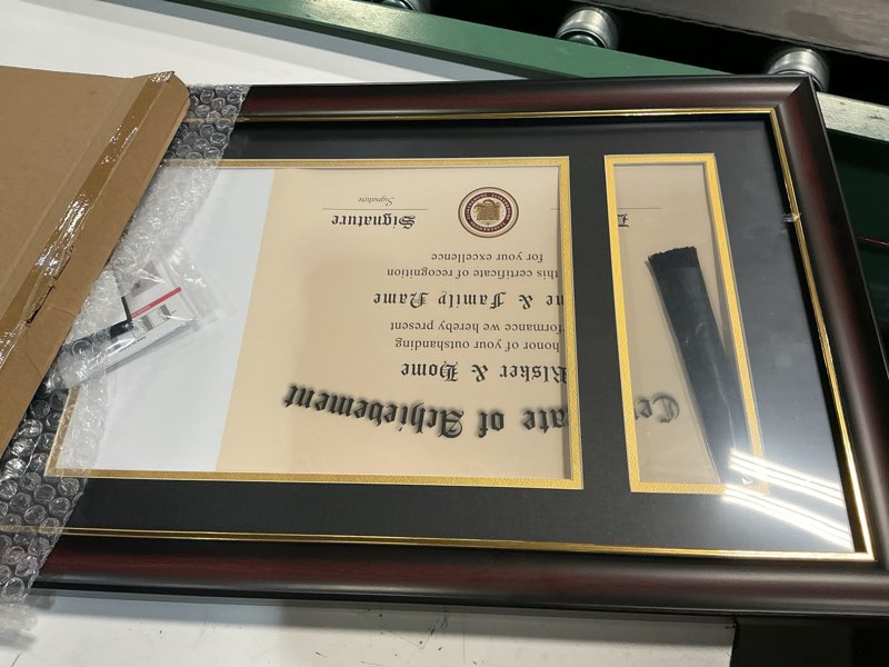Condition photo showing Good Condition for ELSKER&HOME 11x17 Diploma Frames with Tassel Holder for 8.5x11 Certificate Document Shadow Box, Mahogany Frame, Degree Double Mat, Black with Gold Rim Mahogany 11x17 Diploma Frame with Tassel
