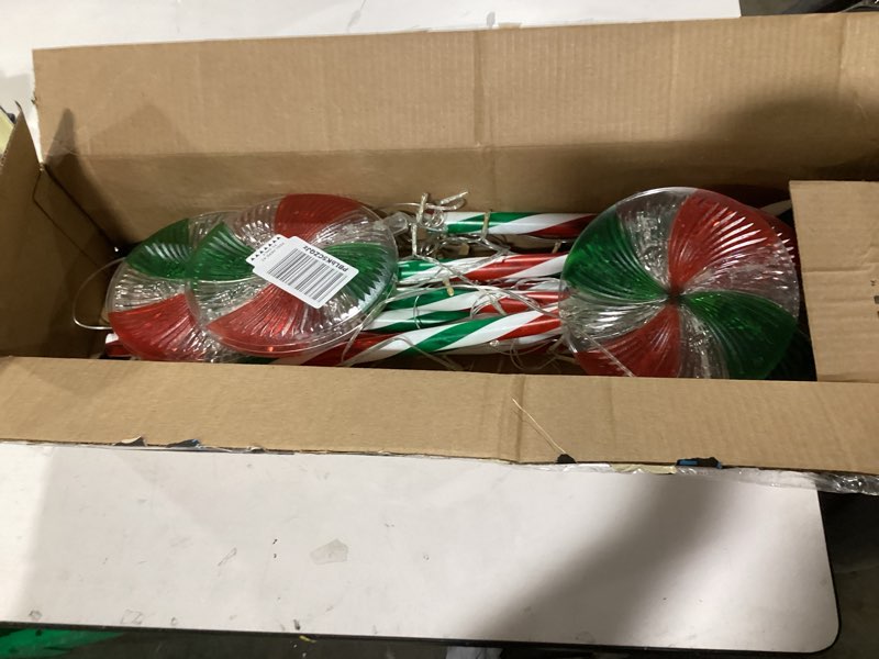 Condition photo showing Good Condition for 6 Pack Christmas Lollipop Pathway Lights Outdoor with 28PC Candy, 27" 176LED Peppermint Candy Cane Decoration with 8 Mode&Timer&Stake, Pathway Marker Light for Walkway Outsides Decor(Red,Green, White)