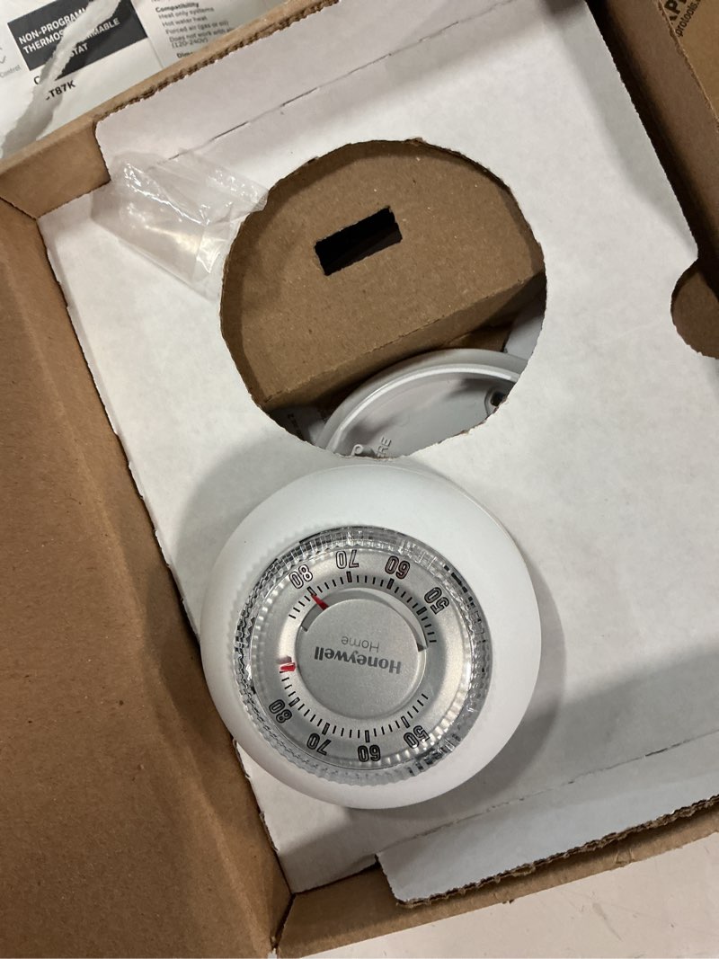 Condition photo showing As Is for honeywell home ct87k1004 the round heat only manual thermostat,large,white,large thermostat round