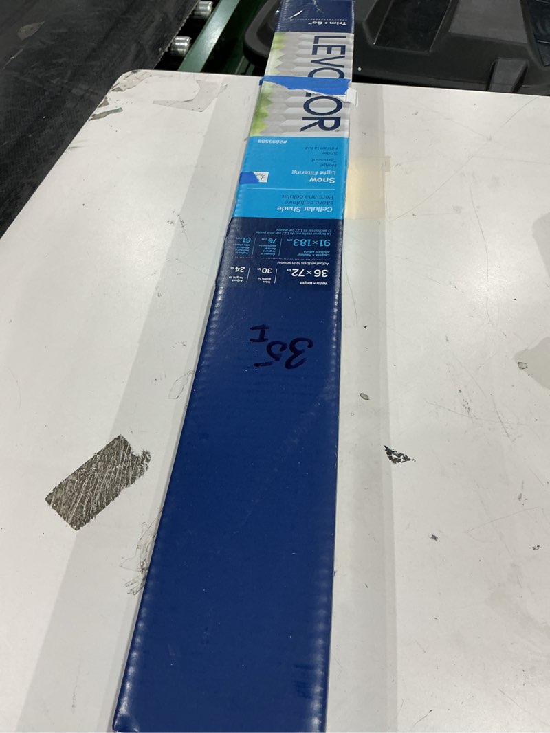 Condition photo showing As Is for levolor 36-in x 72-in snow light filtering cordless cellular shade