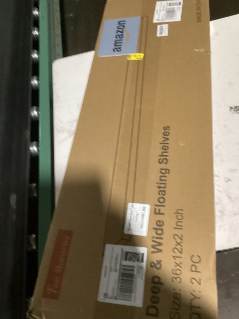 Condition photo showing Good Condition for black floating shelves 36 inch long, 12 inch deep floating shelves for wall, 36 x 12 shelves for wall storage & display, 2" thick floating shelf for bathroom, living room, bedroom, set of 2 black 36"w x 12"d, 2 pack