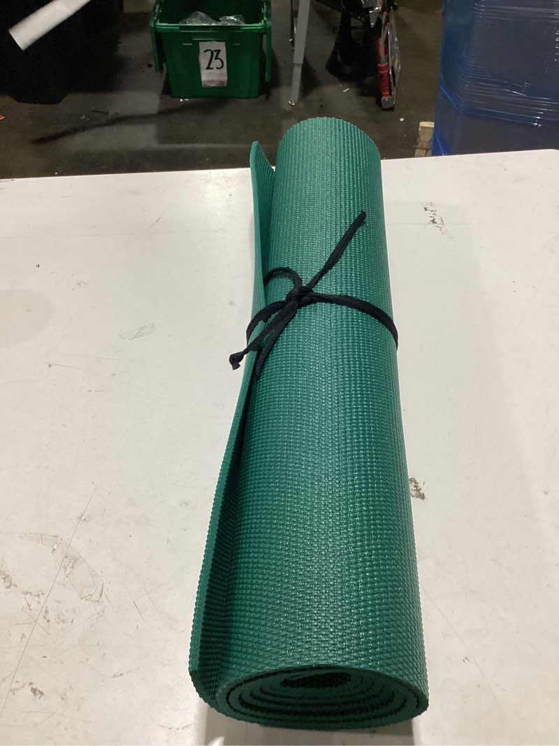 Condition photo showing Good Condition for gaiam essentials 1/4" thin (6mm) yoga & pilates, fitness & exercise mat with easy-cinch carrier strap cusion support for fitness and gym workouts green 1/4" (6mm)