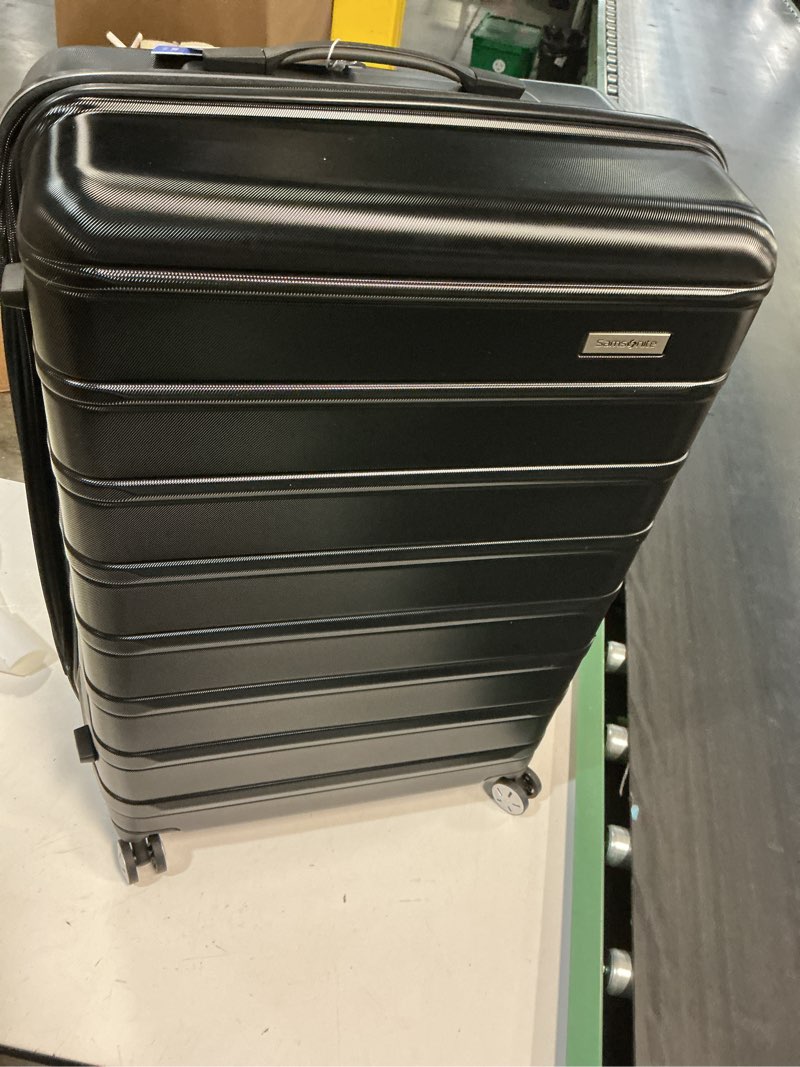 Condition photo showing New/Like New for samsonite omni 2 28-inch large checked hardside luggage with 360° spinner wheels - scratch resistant hardshell - tsa lock - expandable polycarbonate shell for lightweight travel - midnight black checked-large spinner midnight black