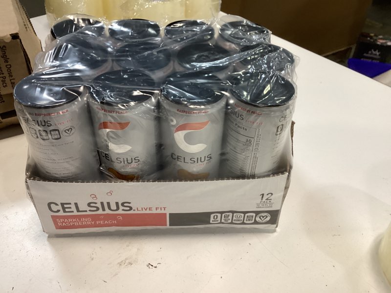 Condition photo showing New/Like New for CELSIUS Sparkling Raspberry Peach, Sugar Free Energy Drink, 12 Fl Oz (Pack of 12) Raspberry Peach 12 Fl Oz (Pack of 12)