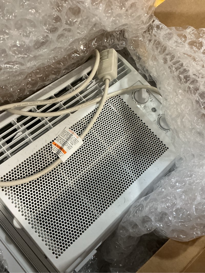 Condition photo showing As Is for midea 5,000 btu easycool small window air conditioner - cool up to 150 sq. ft. with easy-to-use mechanical controls and reusable filter, perfect for small bedroom, living room, home office ( similar