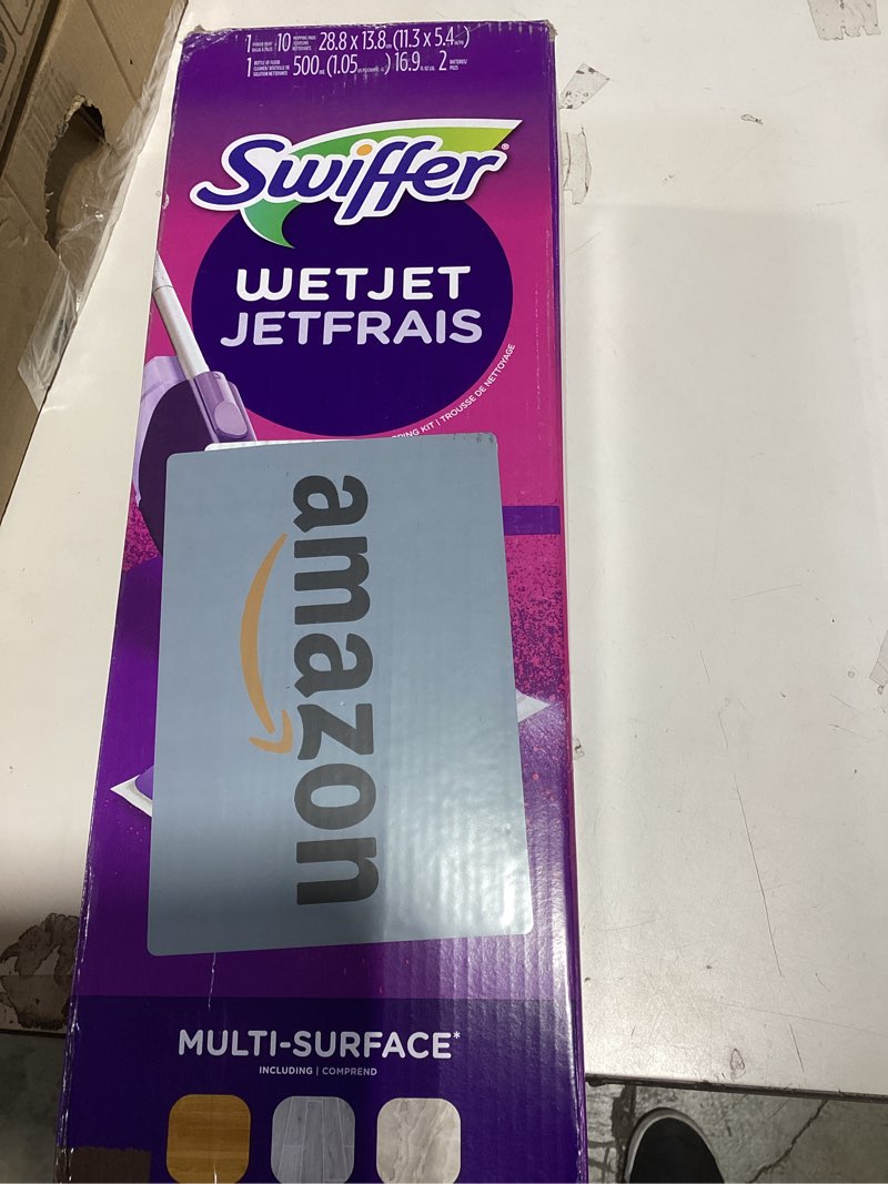 Condition photo showing New/Like New for Swiffer WetJet Hardwood and Floor Spray Mop Cleaner Starter Kit, Includes: 1 Power Mop, 10 Pads, Cleaning Solution, Batteries