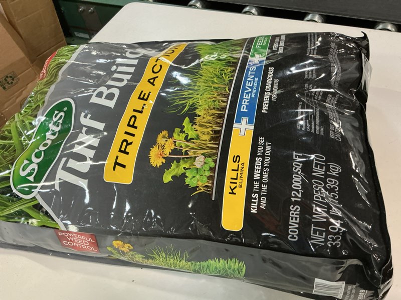 Condition photo showing New/Like New for scotts turf builder triple action1 - weed control, lawn weed killer, crabgrass preventer, and grass fertilizer for lawns, covers 12,000 sq. ft., 33.94 lb.