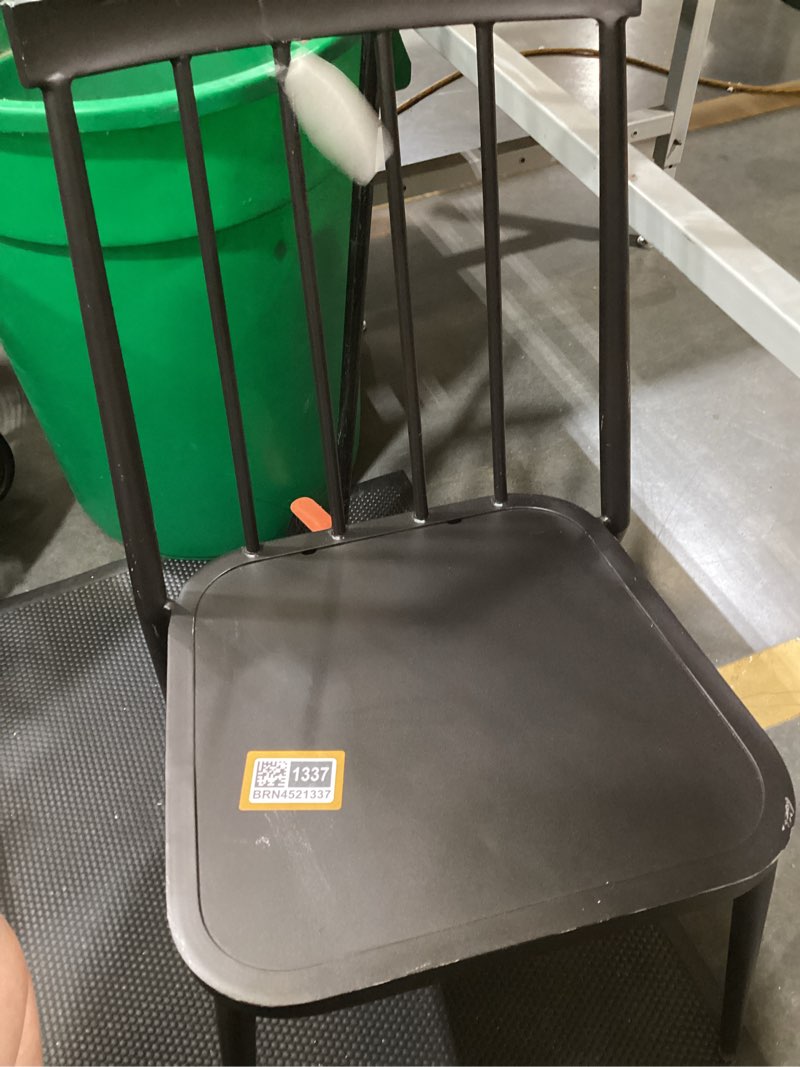 Condition photo showing As Is for windsor armless patio dining stacking chair black -