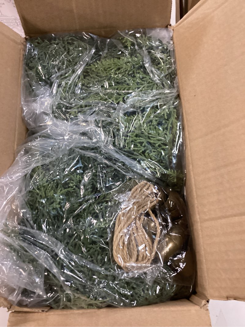 Condition photo showing Good Condition for 9Ft Real Touch Christmas Cedar Garland, Realistic Full Cedar Garland with Bells Decor, Green Artificial Pine Needles Garlands for Mantel, Fireplace, Stairs Railing, Tables, Christmas Decorations 9FT 1