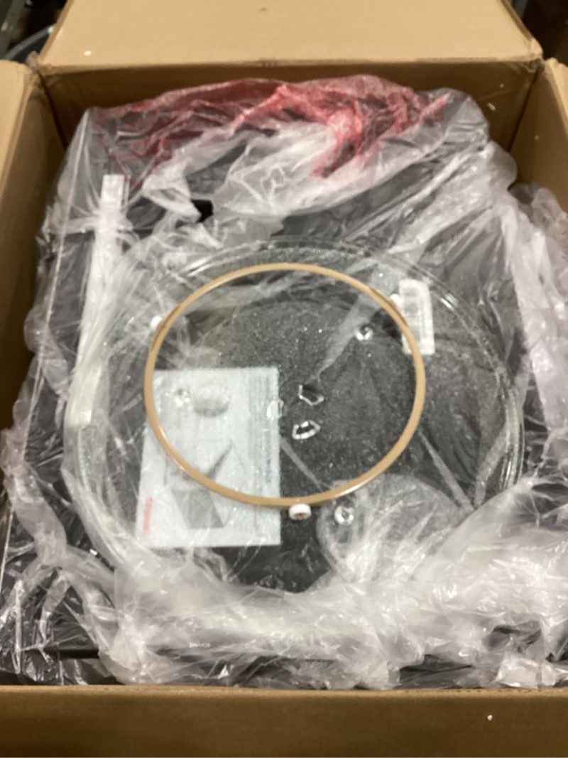 Condition photo showing As Is for toshiba ml-em45pit(ss) countertop microwave oven with inverter technology, kitchen essentials, smart sensor, auto defrost, 1.6 cu.ft, 13.6" removable turntable, 33lb.&1250w, stainless steel inverter-1.6 cu. ft.