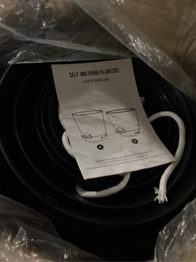 Condition photo showing New/Like New for Indoor Self Watering Planters with Drainage Holes and Saucers, Black, 6 Pots (similar to photo)