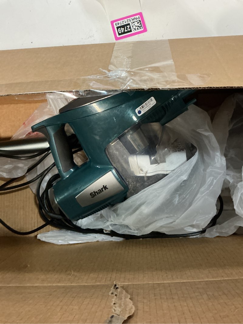 Condition photo showing As Is for shark corded stick vacuum, ultra-lightweight, swivel steering, powerful deep-cleaning, floor-to-ceiling versatility, converts to a handheld vacuum, carpets & hardfloor, green, cs110em