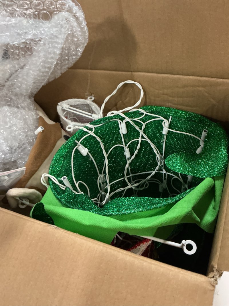 Condition photo showing Good Condition for Hausse Lighted Christmas Outdoor Decor, 38" Height Pre-Lit 3D Tinsel Xmas Green Elf Figure, Light Up Xmas Yard Displays, Plug in for Holiday Party New Year Winter Patio Lawn Garden
