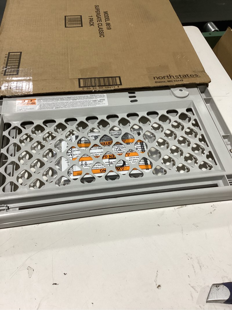 Condition photo showing New/Like New for toddleroo by north states - renew 100% recycled plastic baby gate for doorway; sturdy for indoor & outdoor use: pressure mounted, no drill gate; made in usa; 26" to 42" wide, 26" tall; sandstone