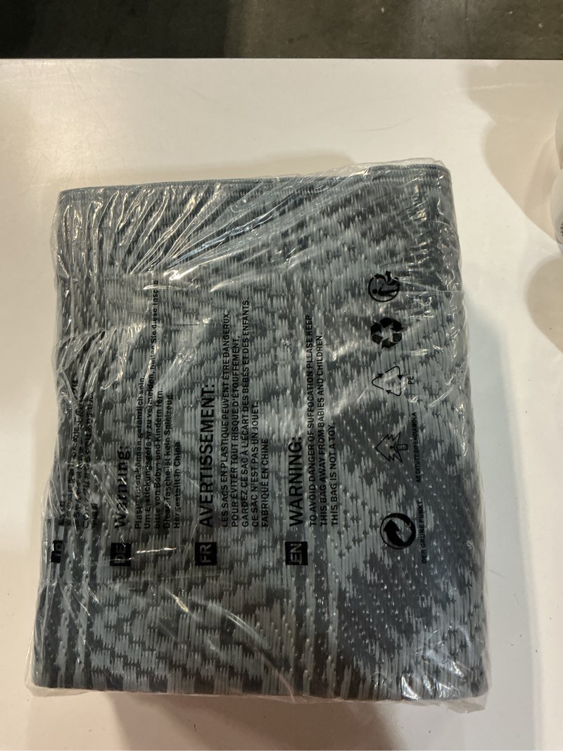 Condition photo showing New/Like New for waterproof outdoor rug 5x8 ft, reversible plastic straw patio camping rugs, outdoor indoor rv mat carpet for patio, outside entry, backyard, deck, bench, picnic, camper(5x8,black&gray) black&gray 5' x 8' (rectangular)