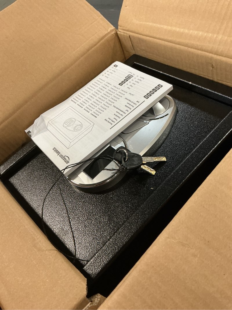 Condition photo showing Good Condition for amazon basics steel security safe and lock box with electronic keypad, secure documents storage, black, 0.5 cubic feet, 13.8"w x 9.8"d x 9.8"h, removable shelf