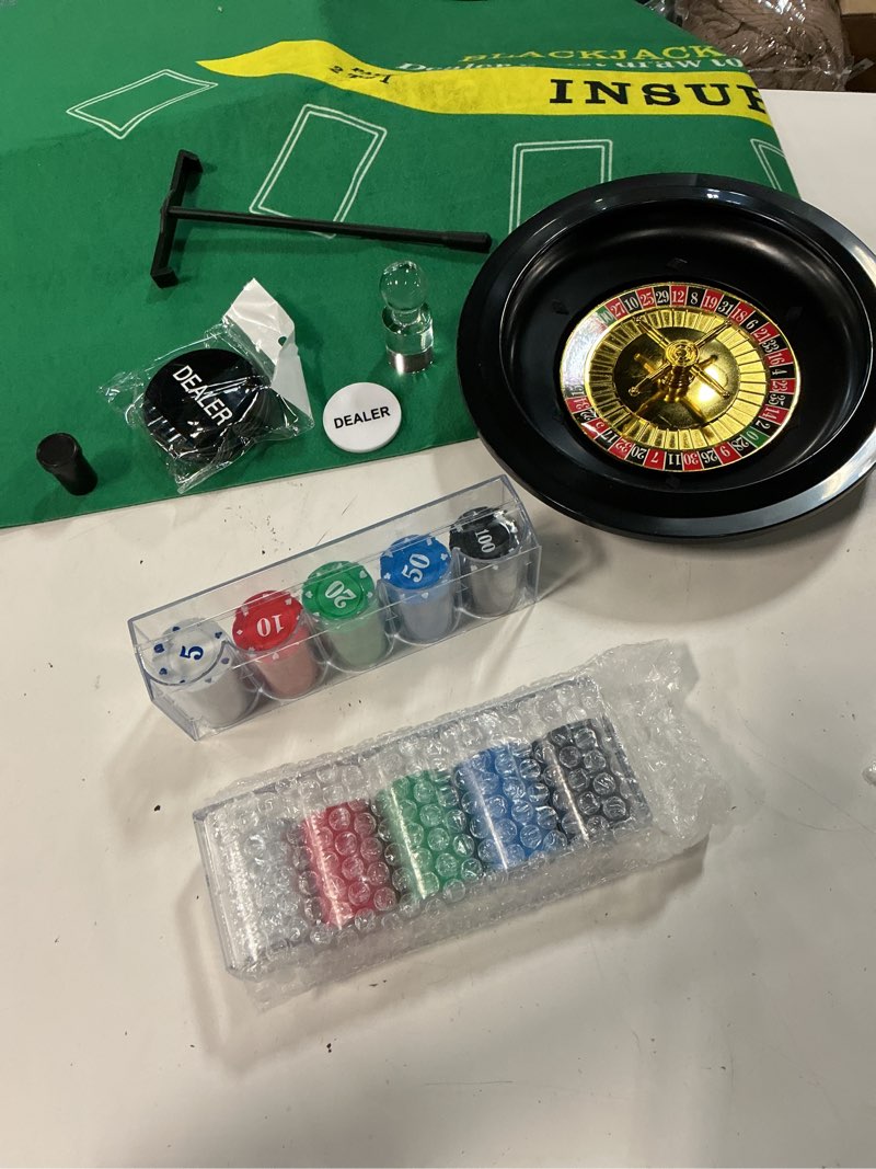 Condition photo showing As Is for 16”roulette wheel game set include 16''roulette table and wheel, 2 pcs 47"x 24" anti-slip rubber mats (roulette & blackjack), 200 poker chips, 2 decks cards, dealer button & win marker for adult