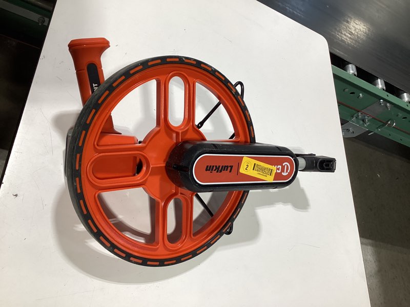 Condition photo showing As Is for 12 in. sae measuring wheel