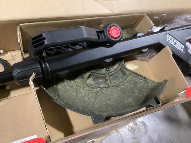 Condition photo showing As Is for hyper tough 12" 20v brushless cordless string trimmer with 20v max 2.0ah battery and charging cable