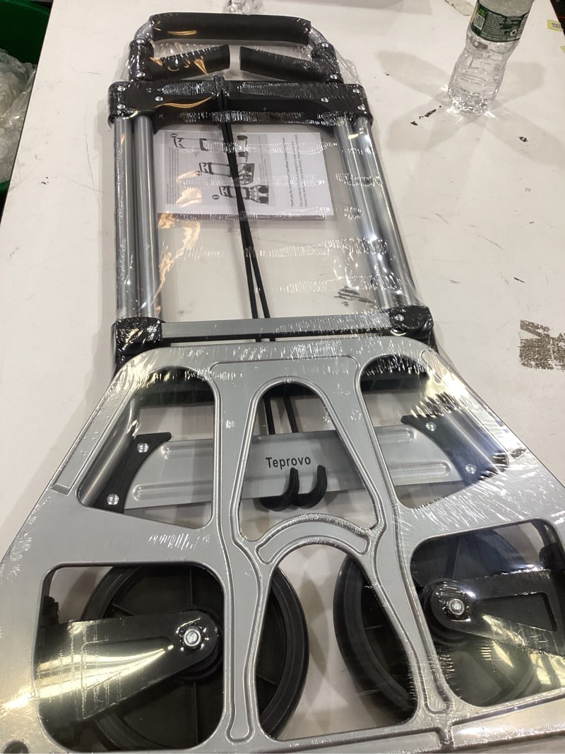 Condition photo showing Good Condition for teprovo folding hand truck dolly cart,340lb capacity portable aluminum dolly cart with telescoping handle and 7 inch rubber wheels for moving,shopping,travel,office use