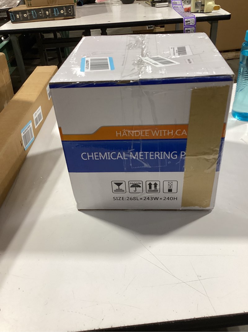 Condition photo showing New/Like New for diaphragm metering pump for chemical laboratory dosing 30 gpd (4.72 lph) 100 psi adjustable flow pvc liquid end with ceramic ball valves includes suction & discharge tubing 3/8" ports
