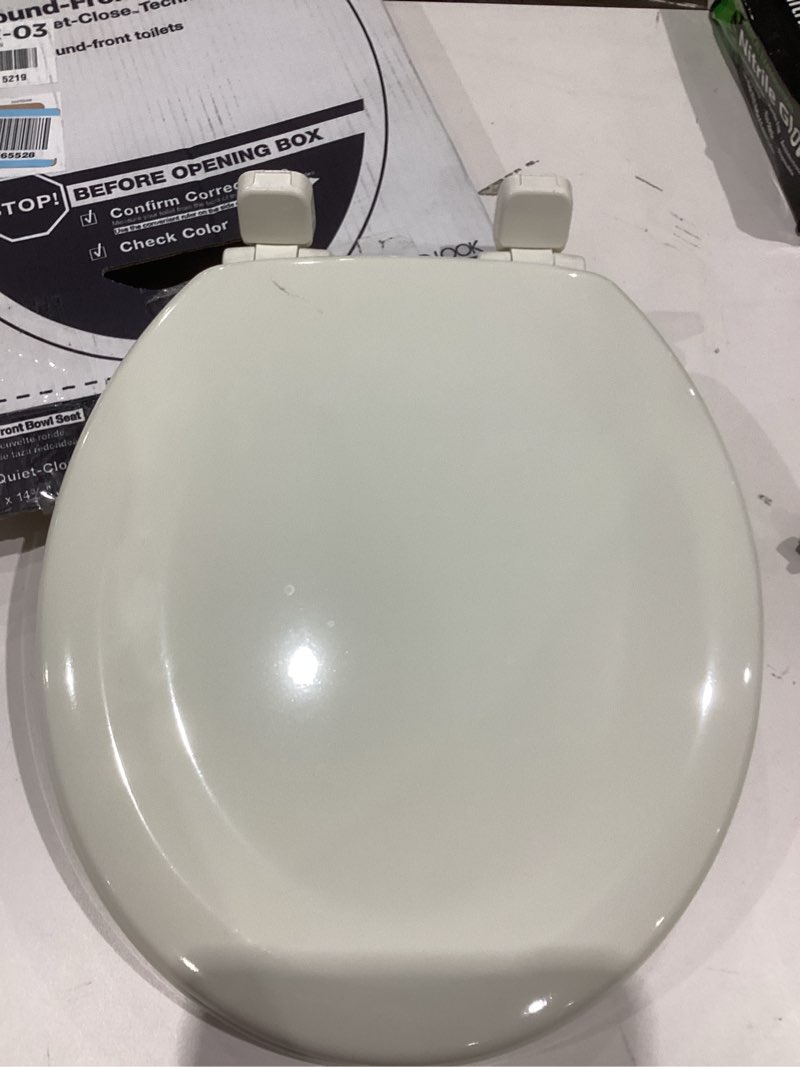 Condition photo showing Good Condition for kohler stonewood quiet-close, round toilet seat soft close, durable wood, easy installation, universal fit, home essentials, biscuit finish, k-20467-96 biscuit round double-hinge