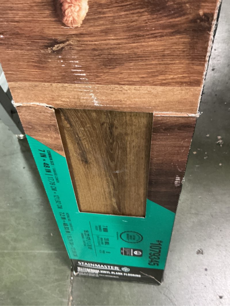 Condition photo showing New/Like New for STAINMASTER PetProtect Wendover Brown Oak 20-mil x 7-in W x 48-in L Waterproof Interlocking Luxury Vinyl Plank Flooring Regular price $