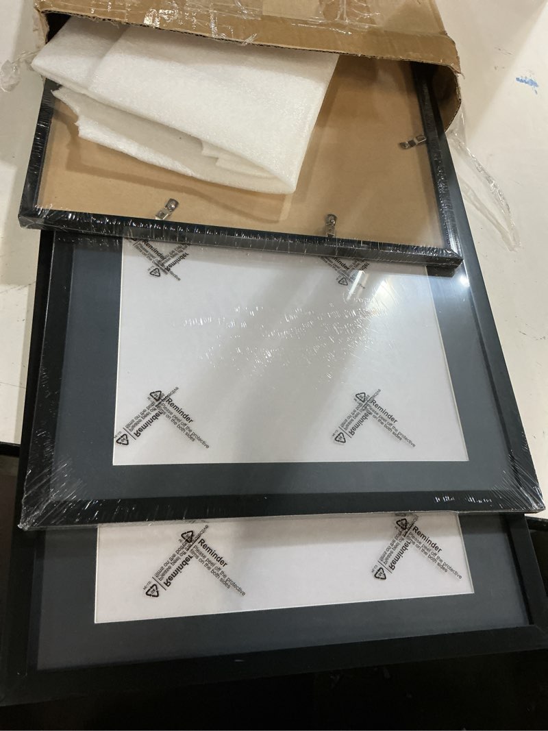 Condition photo showing Good Condition for 3 pcs 11x22 in newspaper frame with mat assorted media article cover frame with hanging hardware 14x24 in newspaper display poster frame for wall decoration (black mat) black frame black mat 3