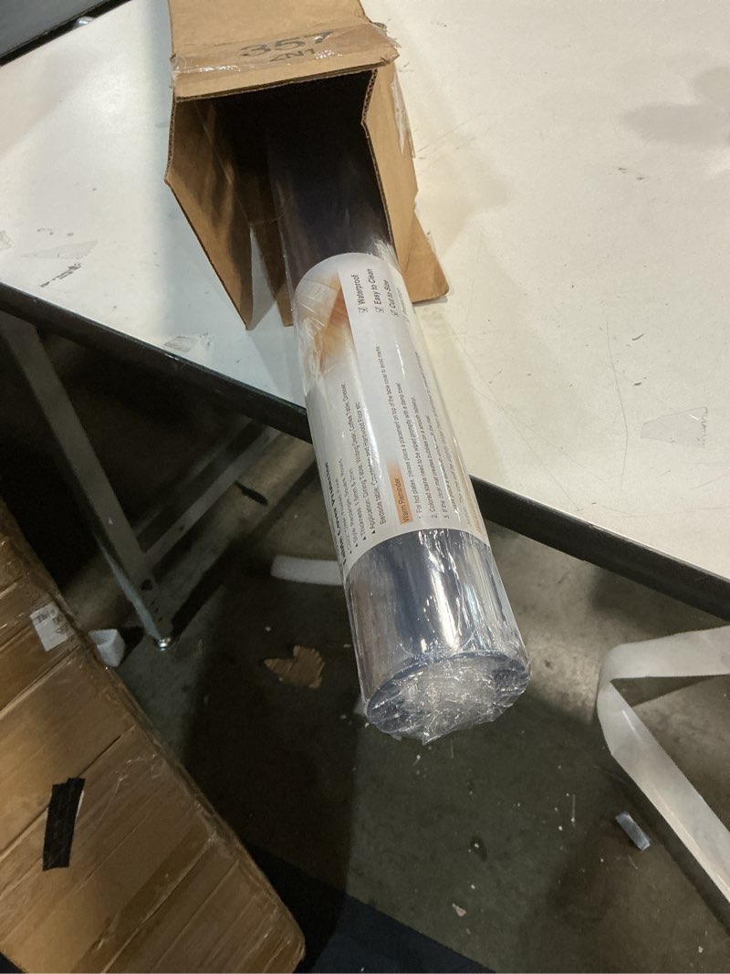 Condition photo showing Good Condition for LovePads Clear Table Cover Protector 42 x 66 Inch, 1.5mm Thick Plastic Table Cover, Table Protector for Dining Room Table, Waterproof Vinyl Tablecloth Table Pad Mat for Kitchen, Dresser, Writing Desk 42" x 66" (Rectangular) Clear 1.5mm