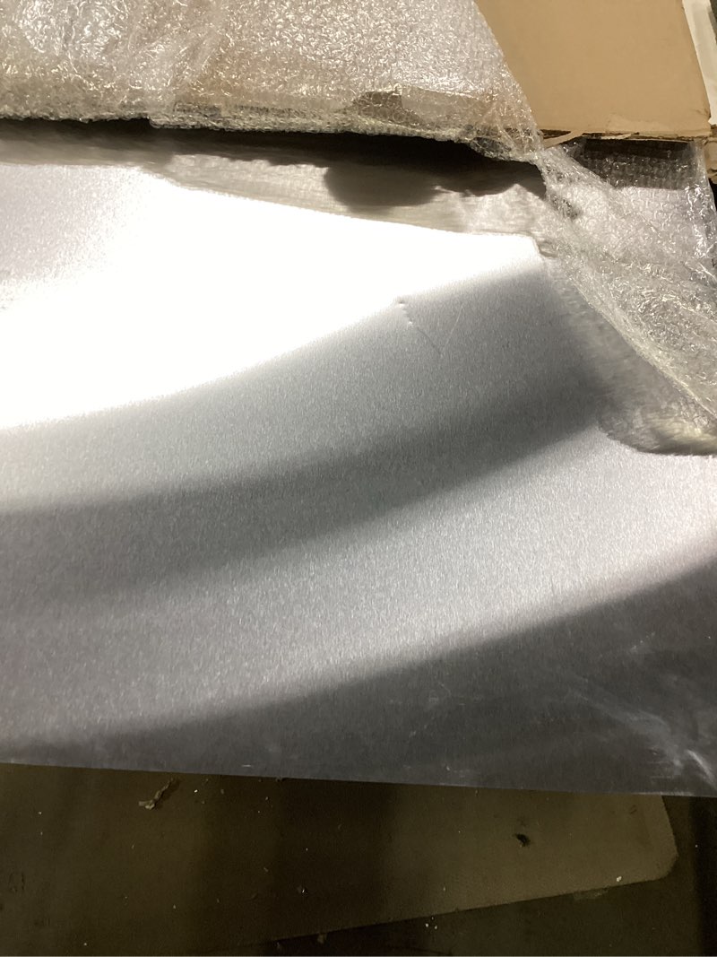 Condition photo showing As Is for Stainless Steel Backsplash for Stove - Ultra Flat and Flushed Metal Panel Splatter Guard for Kitchen Wall, Stove Backsplash Panel with 4 Pre-Drilled Holes, Easy Install ?29.5" x 24" ? Silver 29.5" x 24"