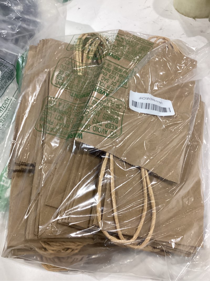 Condition photo showing Good Condition for XPCARE 200Pcs Paper Gift Bags 5.25x3.25x8.25'',Gift Wrap Bags with Handles Brown Kraft Paper Bags for Small Business Paper Bags Bulk for Birthday Party Favors Shopping Retail 200 Count (Pack of 1) Brown-200Count