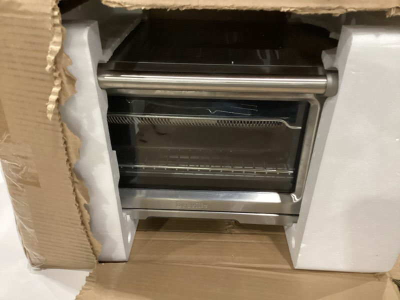 Condition photo showing As Is for breville bov900bss smart oven air fryer pro and convection oven, brushed stainless steel, not tested, incomplete