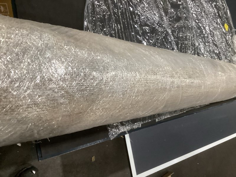 Condition photo showing As Is for Loloi Magnolia Home by Joanna Gaines Junie Collection JUE-06 Lagoon/Natural 7'-10" x 10'-2", .38" Pile Height, Area Rug Lagoon / Natural 7'10" x 10'2" (Rectangular)