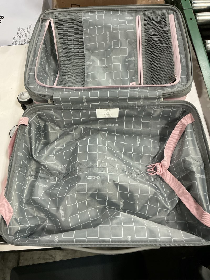 Condition photo showing As Is for american tourister checkered 2.0 hardside large spinner suitcase - light pink