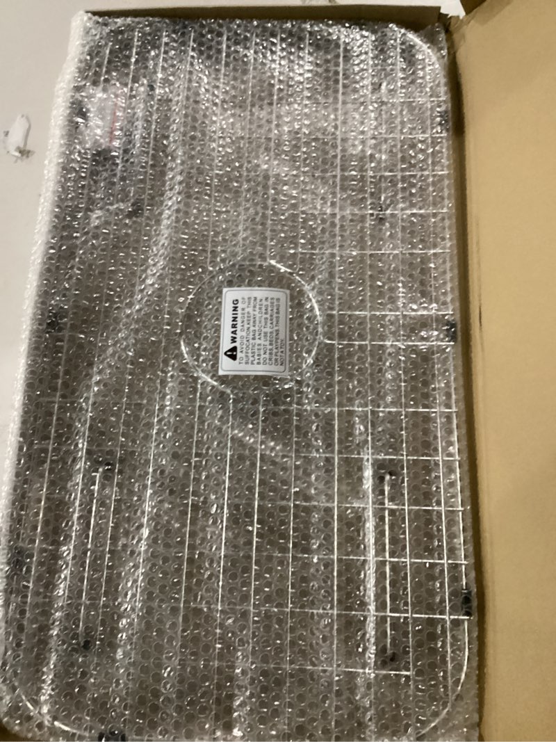 Condition photo showing New/Like New for Sink Protector Grid 26-1/16" x 14-1/16", Centered Drain with Corner Radius 3-1/2", 304 Stainless Steel Material Centered Drain