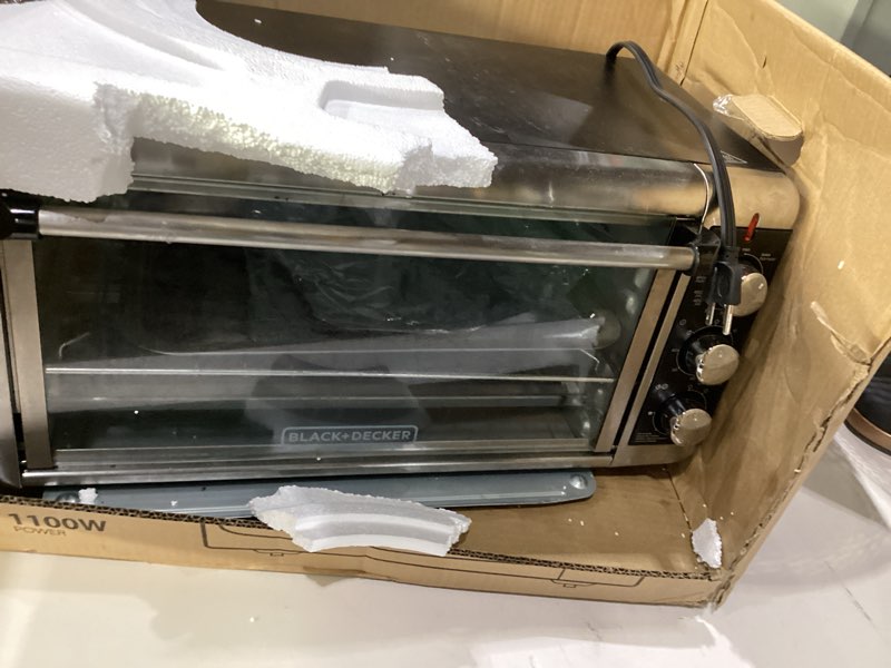 Condition photo showing As Is for toshiba em131a5c-bs countertop microwave ovens 1.2 cu ft, 12.4\" removable turntable smart humidity sensor 12 auto menus mute function eco mode easy clean interior black color 1000w 1.2 cu.ft, not tested, incomplete