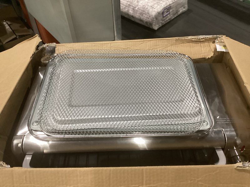 Condition photo showing Good Condition for NOT TESTED BLACK+DECKER Crisp 'N Bake Air Fryer Countertop Convection Toaster Oven, Large Capacity, 6-Slice, 5-in-1, Fits 12” Pizza, 60-Min Timer, Bake, Broil, Air Fry, Toast, Keep Warm, Stainless Steel