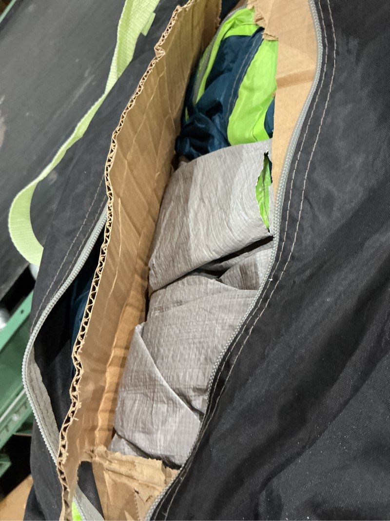 Condition photo showing As Is for ozark trail 8 person dual dome tent - 17ft. x 9ft.