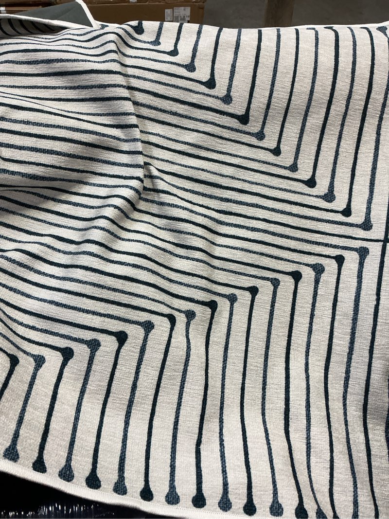 Condition photo showing As Is for RUGGABLE x Jonathan Adler Machine Washable Modern Area Rug – Inkdrop Slate Blue 5X6, Stain-Resistan
