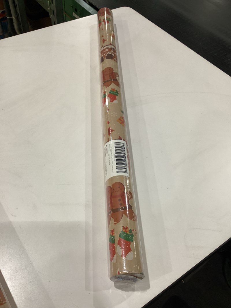 Condition photo showing New/Like New for Ray of sun christmas wrapping paper gingerbread man 30inx32ft